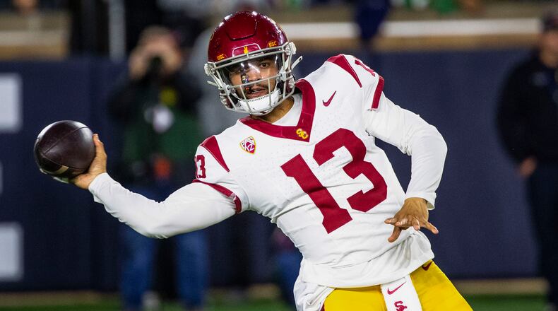 Southern California quarterback Caleb Williams throws a pass during the first half an NCAA college football game against Notre Dame, Saturday, Oct. 14, 2023, in South Bend, Ind. (AP Photo/Michael Caterina)