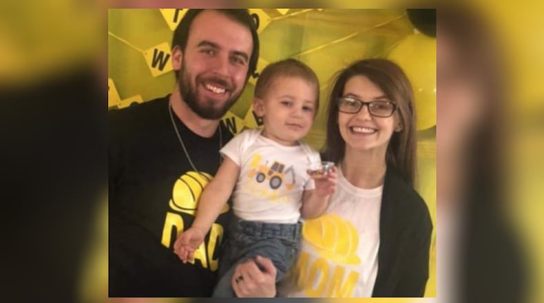 After a crash killed 2-year-old Cohen Zayne Bryson (center) and injured his parents, Joshua and Santana Bryson, the woman gave birth to a boy.