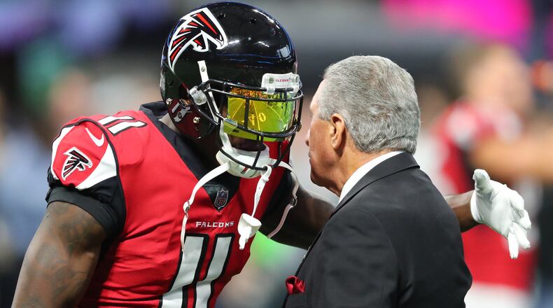 Julio Jones and Falcons owner Arthur Blank. (AJC file photo)