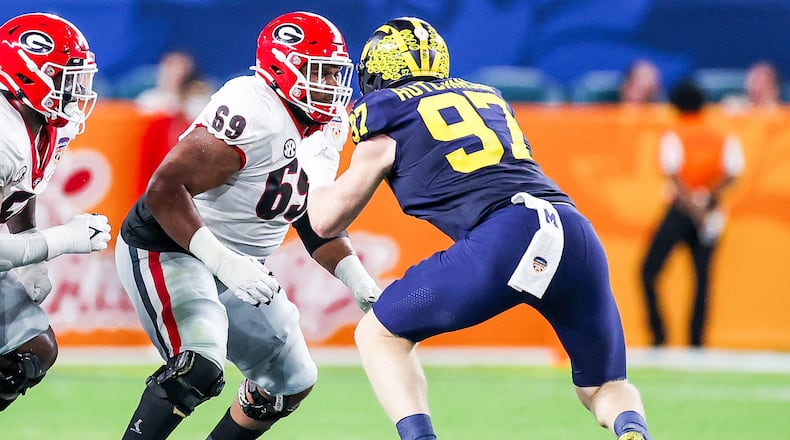 Georgia offensive lineman Jamaree Salyer (69) had a huge game against Michigan and All-American defensive end Aidan Hutchinson in the College Football Playoff semifinal game at the Orange Bowl against at Hard Rock Stadium in Miami Gardens, Fla., on Friday, Dec. 31, 2021. (Photo by Tony Walsh)