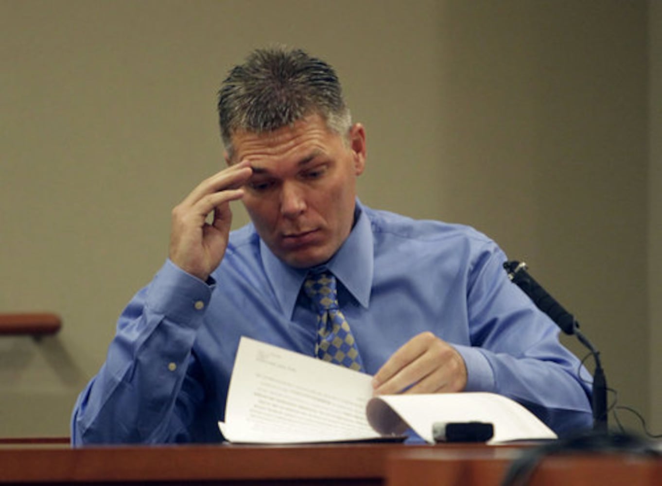 Dunwoody murder suspect faces wife in court