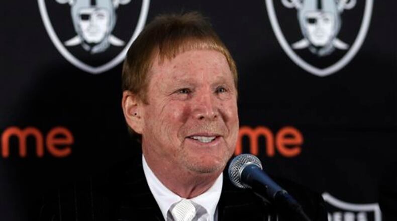 FILe - In this Feb. 11, 2016 file photo, Oakland Raiders owner Mark Davis speaks during a media conference in Oakland, Calif. Raiders owner Mark Davis says he wants to move the team to Las Vegas and is willing to spend a half billion dollars as part of a deal for a new stadium in the city. Davis upped the ante in a bid to move the team to this gambling city, appearing Thursday, April 28, 2016, alongside soccer great David Beckham and billionaire casino owner Sheldon Adelson before a committee studying the idea of a $1.4 billion stadium. (AP Photo/Ben Margot, File)