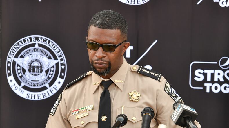 Henry County Sheriff Reginald Scandrett announces de-escalation training for 1,000 Henry and Fulton County deputies.
