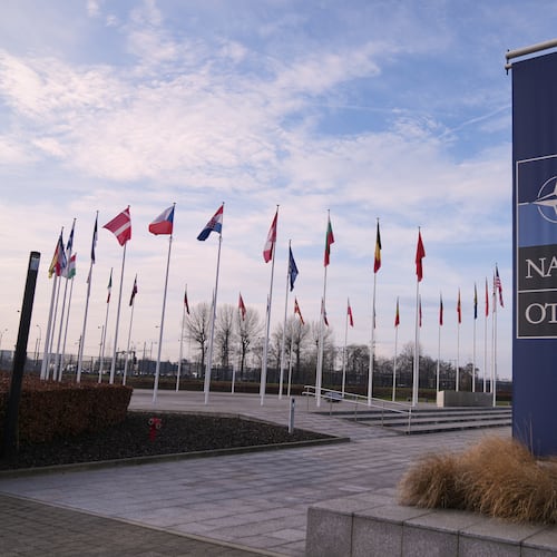 FILE - Flags flap in the wind outside NATO headquarters in Brussels, Jan. 19, 2026. (AP Photo/Virginia Mayo, File)