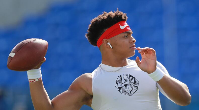Nov 3, 2018 Lexington: Georgia quarterback Justin Fields takes pregame warmups before playing Kentucky in a NCAA college football game on Saturday, Nov. 3, 2018, in Lexington. Curtis Compton/ccompton@ajc.com