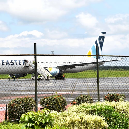 A plane carrying the deportees from the United States arrives at the Roberts International Airport outside of Monrovia, Liberia, Thursday, Aug. 20, 2026. (AP Photo/Alexander Wiaplah)