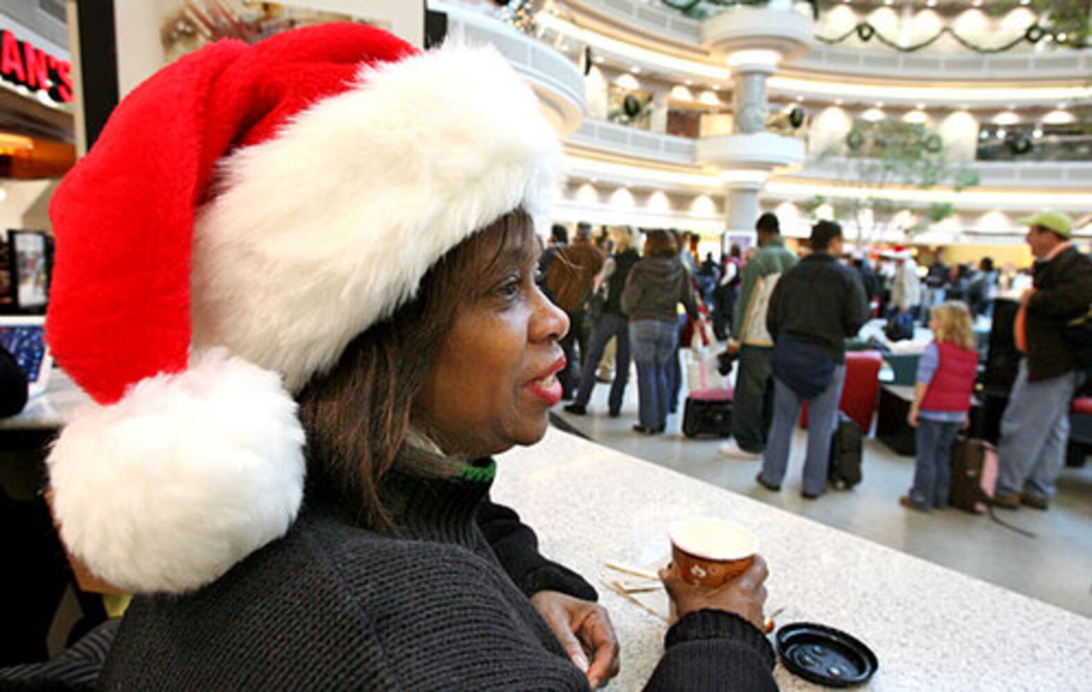 Airport lines moving as travelers scurry home