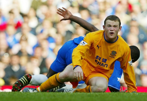FILE - Everton's Wayne Rooney looks on during their English Premier League soccer match at Chelsea's Stamford Bridge ground in west London, Saturday April 17, 2004. (AP Photo/Alastair Grant, File)