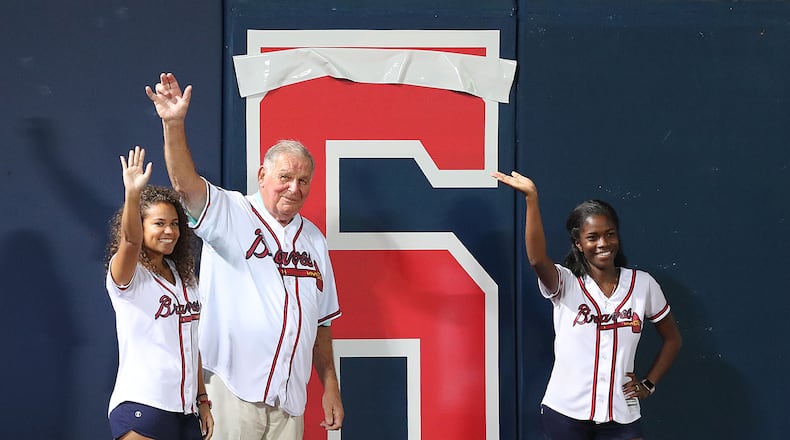 Former Braves Hall of Fame manager Bobby Cox tears down the number ‘6’, his old uniform number, counting down games left to play at Turner Field. Old No. 3 Dale Murphy took down the number Friday. Who will be the final two? (Curtis Compton /ccompton@ajc.com)