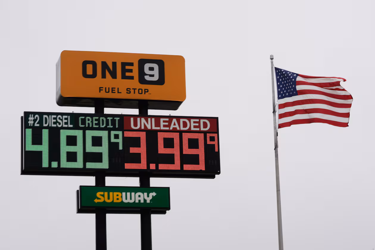 The American Flag flies next to a One9 Fuel Stop sign displaying gas prices for diesel and unleaded gas in Wilmington, Ohio, Wednesday, June 10, 2026. (AP Photo/Carolyn Kaster)