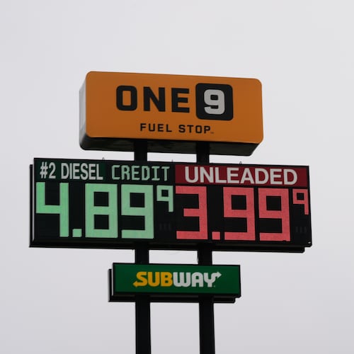 The American Flag flies next to a One9 Fuel Stop sign displaying gas prices for diesel and unleaded gas in Wilmington, Ohio, Wednesday, June 10, 2026. (AP Photo/Carolyn Kaster)