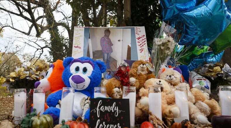 Teddy bears, mementos, and balloons make up a makeshift memorial at the site of Monday’s fatal school bus crash in Chattanooga, Tenn. The crash killed five Woodmore Elementary stuudents. (Doug Strickland / Chattanooga Times Free Press via AP)