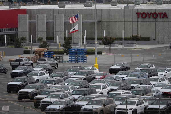 New Toyota vehicles are stored at the Toyota Logistics Service Inc., an imports processing facility at the Port of Long Beach in Long Beach, Calif., Wednesday, March 26, 2025. (AP Photo/Damian Dovarganes)