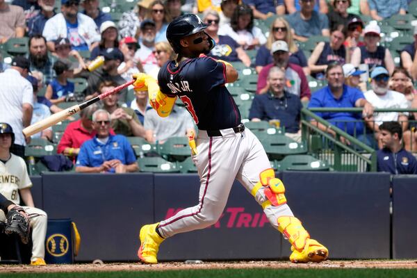 Atlanta Braves' Ronald Acuña Jr. (13) hits a two-run home run during the fourth inning of a baseball game against the Milwaukee Brewers, Wednesday, June 11, 2025, in Milwaukee. (AP Photo/Kayla Wolf)