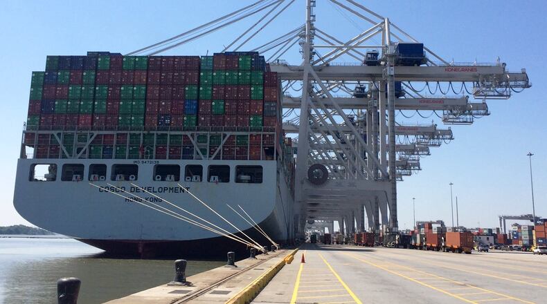 Savannah, Ga.: A pilot craft guides the Cosco Development, the largest container ship to ever call on an East Coast port, as it plies through the Savannah River en route to the Garden City Terminal on the Savannah River on Thursday, May 11, 2017. J. Scott Trubey/strubey@ajc.com