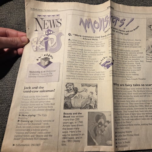 Ed Hula holds the "News for Kids" article that features his question in the May 17, 1993, edition of the newspaper. (Courtesy)