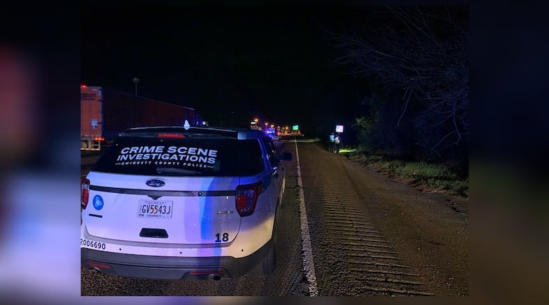 Police closed the northbound lanes of I-85 near Jimmy Carter Boulevard while they investigated a homicide Friday morning.
