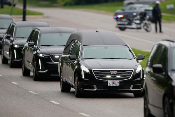 A funeral procession leaves Congregation Beth Torah after a funeral for Sarah Milgrim, a staffer at the Israeli Embassy who was killed last week outside a Washington Jewish museum, Tuesday, May 27, 2025, in Overland Park, Kan. (AP Photo/Charlie Riedel)
