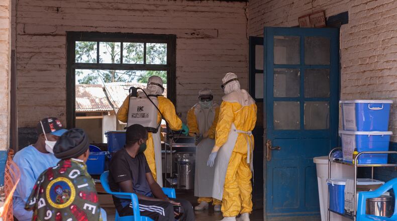 Health workers prepare for duty at the Mongbwalu treatment center in Mongbwalu, Congo, Friday, June 5, 2026. (AP Photo/Moses Sawasawa)