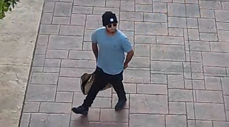 Police are searching for this man in connection with a report of shots fired outside the Outlet Shoppes at Atlanta in Woodstock. (Credit: Woodstock Police Department)