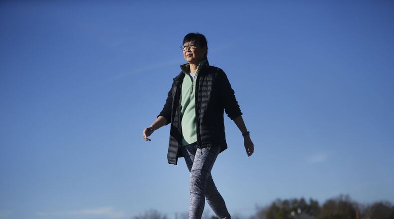 Mae Onsry, 66, of Dallas, walks near Flag Pole Hill in Dallas on Monday, Jan. 8, 2018. Onsry had never followed a workout routine before volunteering to be part of a study, but is now an avid walker. The study was conducted by the Dallas-based Institute for Exercise and Environmental Medicine, a collaboration between UT Southwestern Medical Center and Texas Health Presbyterian Hospital Dallas. (Rose Baca/The Dallas Morning News/TNS)
