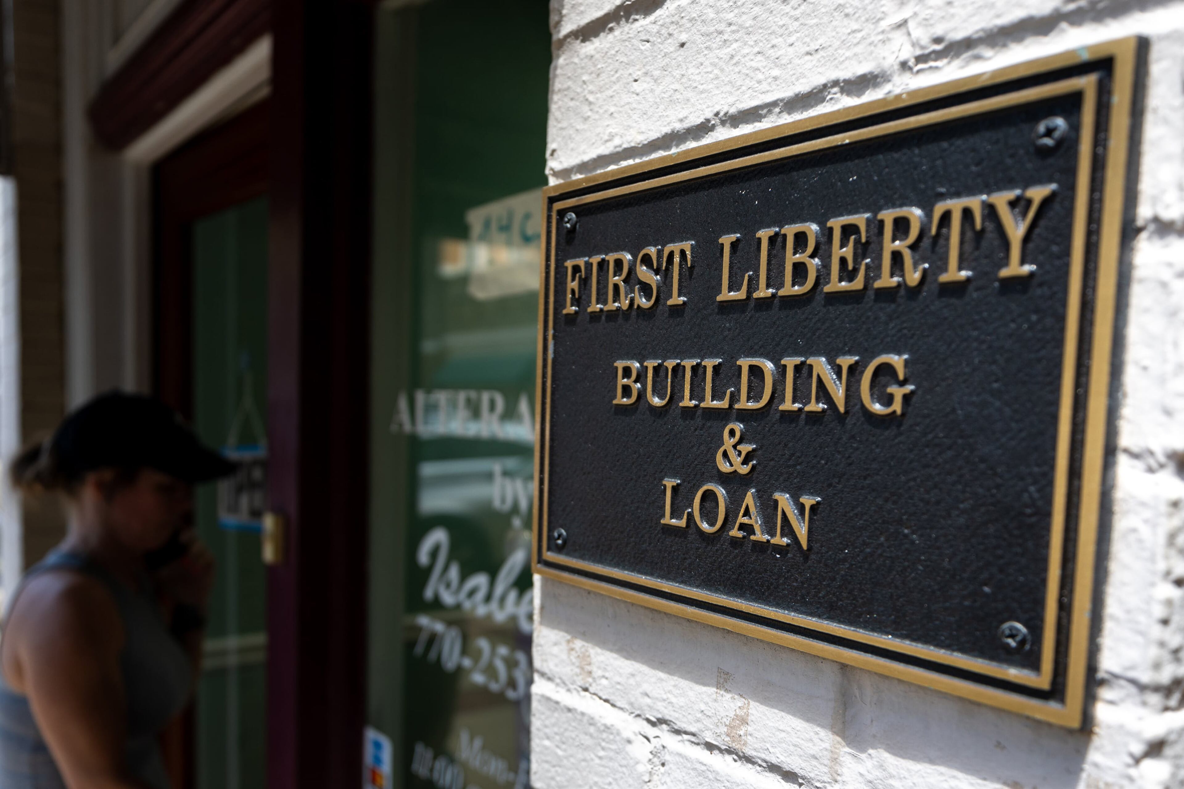 A sign for First Liberty Building & Loan in downtown Newnan.