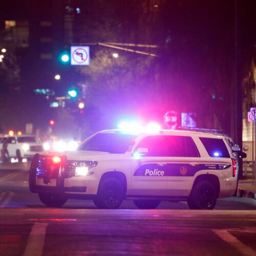 FILE - Phoenix Police Department vehicles block off a street in Phoenix, May 30, 2020. (AP Photo/Ross D. Franklin, File