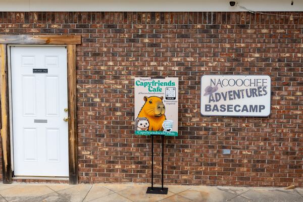 A sign for Capyfriends Café is seen outside the cafe in Helen on Wednesday, July 23, 2025. (Arvin Temkar/AJC)