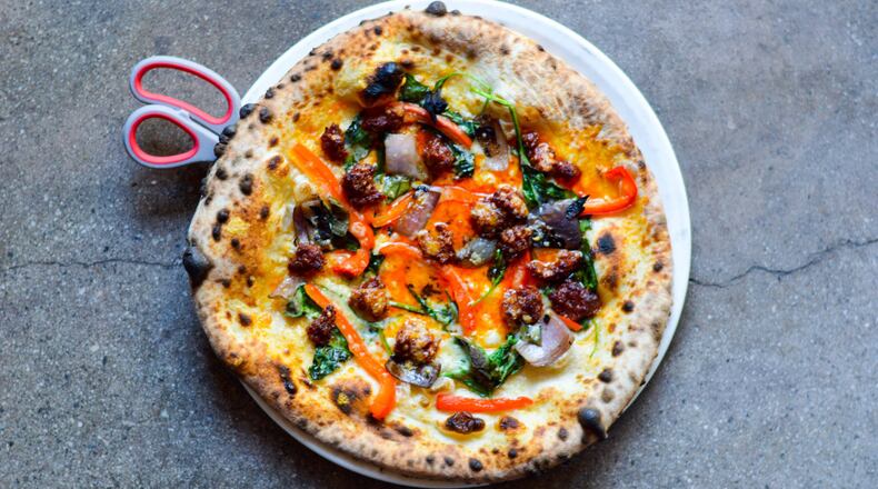 The ‘Nduja Pizza at Double Zero is an indulgence. CONTRIBUTED BY HENRI HOLLIS