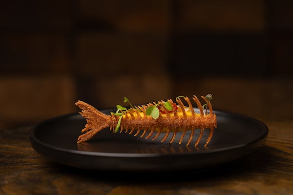 The ackee and saltfish fishbone brunch from chef Tamara Hewitt's pop-up at Pullman Yards, Peckish, stands out for its realistic look. (Courtesy of Atlanta Creative Media)