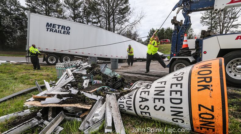 The ramp from I-20 East to I-285 North in Fulton County was blocked for three hours early Monday. JOHN SPINK / JSPINK@AJC.COM
