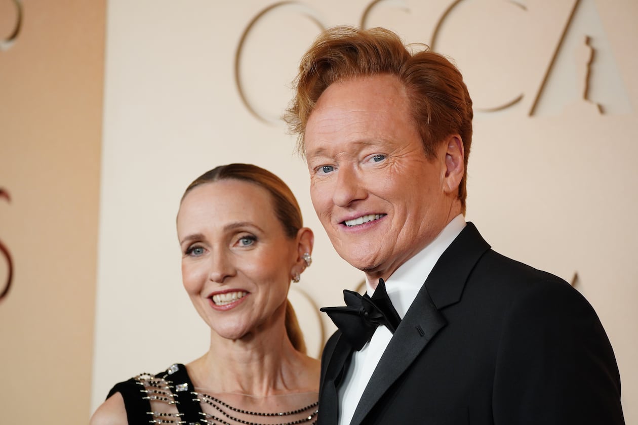 Liza Powel O'Brien, left, and Conan O'Brien arrive at the Oscars on Sunday, March 15, 2026, at the Dolby Theatre in Los Angeles. (Photo by Jordan Strauss/Invision/AP)