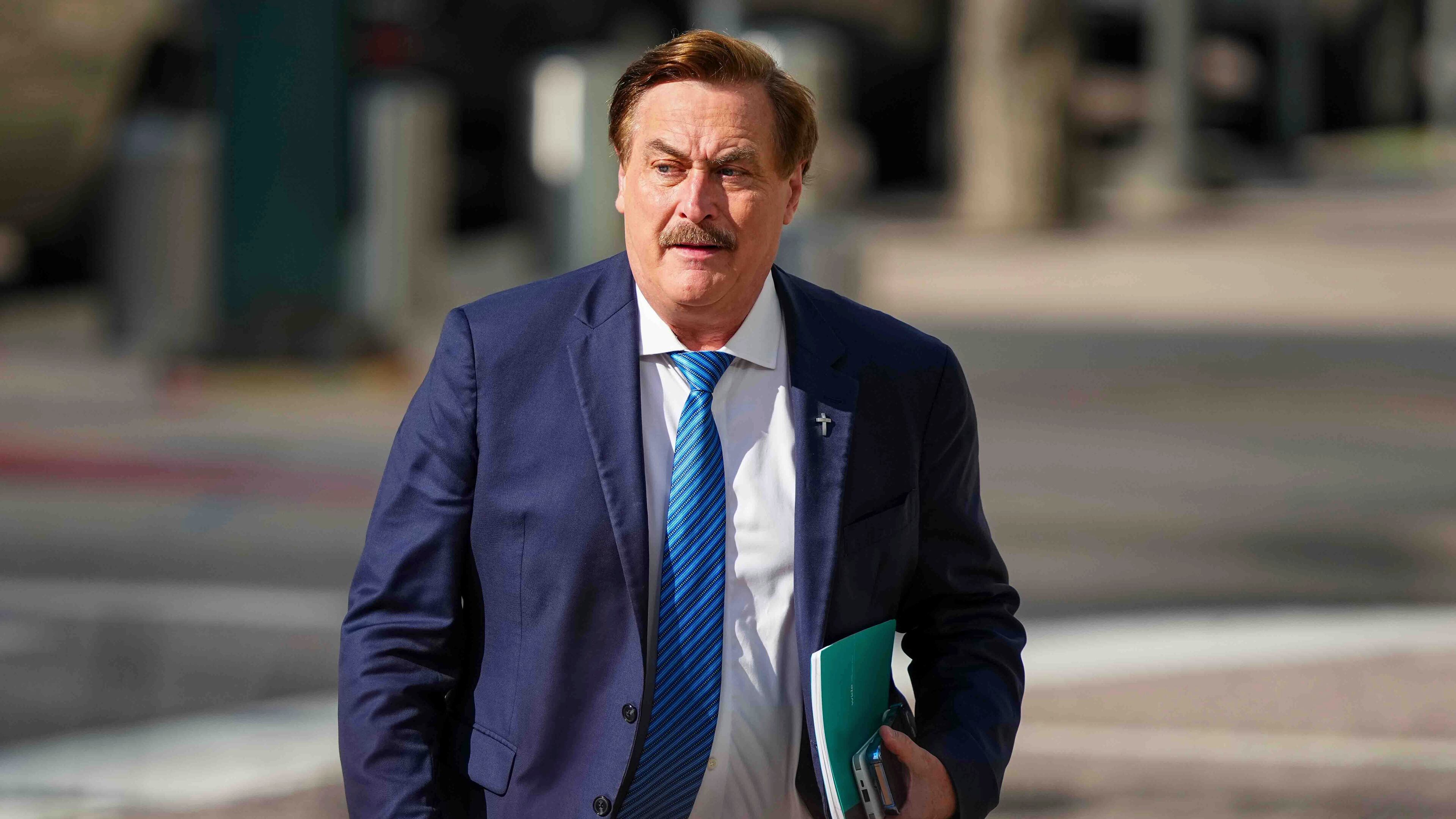 FILE - Mike Lindell walks into federal district court for a defamation trial, June 5, 2025, in Denver. (AP Photo/Jack Dempsey, File)