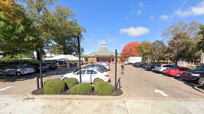 Duluth is considering adding a 2,500-square-foot restaurant building on the Downtown Paver Lot, the parking area between Taylor Park/City Hall and the Truck and Tap restaurant. (Google Maps)