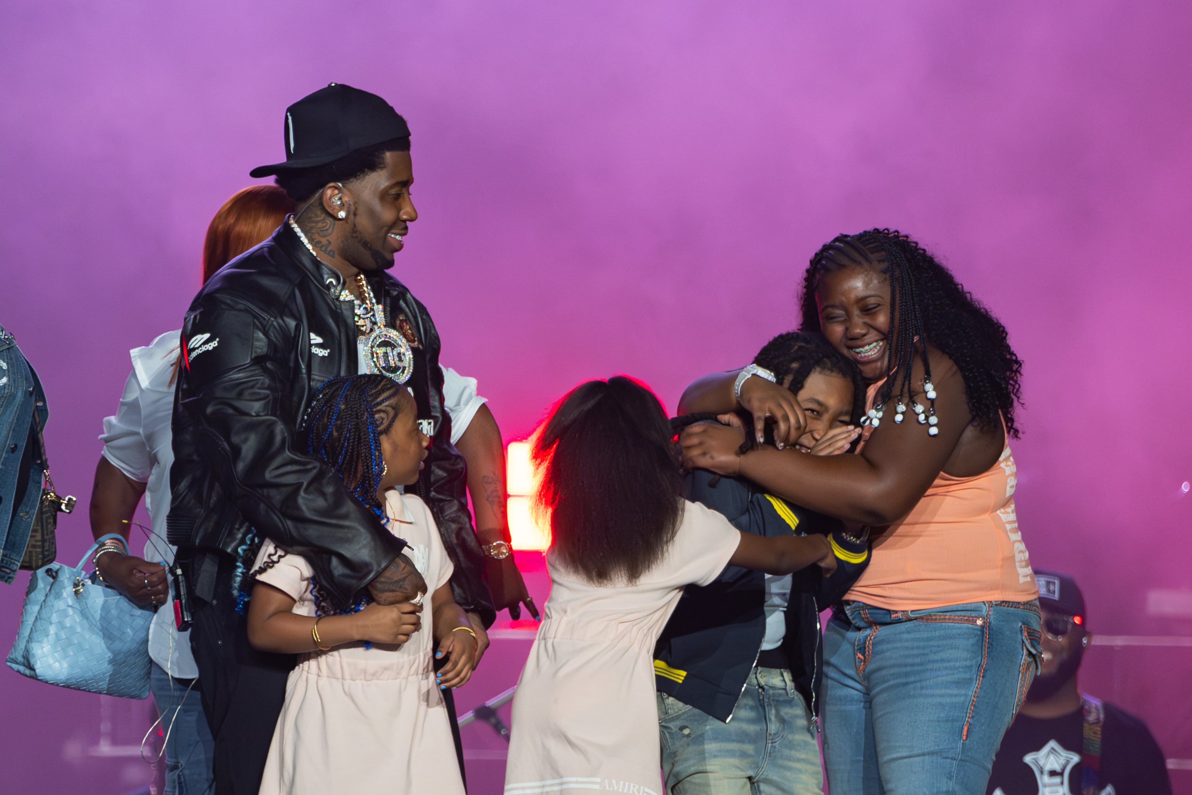 Rapper YFN Lucci was joined by his four children at the end of his sold-out homecoming show at State Farm Arena. (Courtesy of State Farm Arena)
