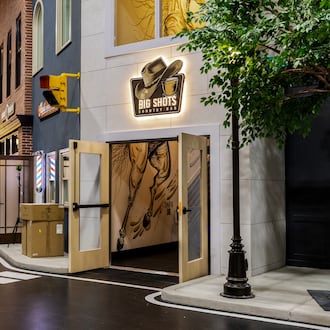 An exterior view of Big Shots, the Western-themed bar at You42 Studios in Roswell. (Courtesy of Heidi Harris)