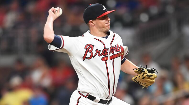 Brad Brach of the Atlanta Braves throws in eighth inning pitch against the Miami Marlins at SunTrust Park on July 30, 2018 in Atlanta, Georgia. (Photo by Scott Cunningham/Getty Images)