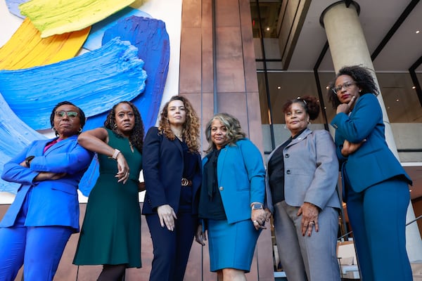 Clayton County District Attorney Tasha Mosley (from left), DeKalb DA Sherry Boston, Douglas DA Dalia Racine, Cobb DA Sonya Allen, Gwinnett DA Patsy Austin-Gatson and Rockdale DA Alisha Johnson are a powerful force in metro Atlanta. (Natrice Miller/AJC)