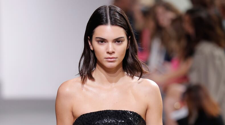 Kendall Jenner and Pepsi are facing criticism for a protest-themed commercial that some consider tone-deaf. (Photo by JP Yim/Getty Images for Michael Kors)