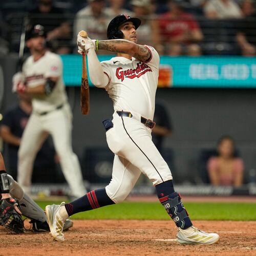 Cleveland Guardians' Brayan Rocchio watches his game winning home run in the ninth inning of a baseball game against the Chicago White Sox in Cleveland, Thursday, July 2, 2026. (AP Photo/Sue Ogrocki)