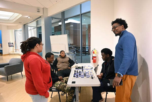 James Ford (right), assistant director, talks to Naomi Barlow (left), 17, at YouthForce Innovation Hub inside Georgia Square Mall on May 7, 2025, in Athens. (Hyosub Shin/AJC)