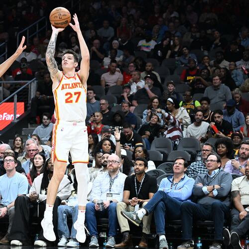The Hawks traded Vit Krejci (right) — pictured shooting against Portland's Shaedon Sharpe in April — to the Trail Blazers for Duop Reath and two second-round draft picks. (Hyosub Shin/AJC 2025)
