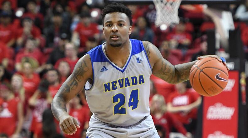 Jordan Caroline  of the Nevada Wolf Pack brings the ball up the court against the UNLV Rebels during their game at the Thomas & Mack Center on January 29, 2019 in Las Vegas, Nevada. The Wolf Pack defeated the Rebels 87-70.  (Photo by Ethan Miller/Getty Images)