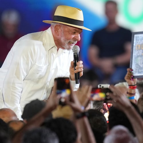 Brazilian President Luiz Inacio Lula da Silva speaks to supporters during the Workers' Party convention, where he was confirmed as the party's presidential candidate for the next election in Sao Paulo, Brazil, Sunday, Aug. 2, 2026. (AP Photo/Andre Penner)