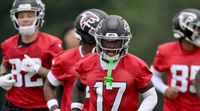 Falcons wide receiver Zachariah Branch (center) runs a drill during an OTA workout at the team's training facility Wednesday, May 27, 2026, in Flowery Branch. (Hyosub Shin/AJC)