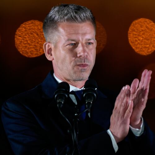 Peter Magyar, the leader of the opposition Tisza party applauds after claiming victory in a parliamentary election in Budapest, Hungary, Sunday, April 12, 2026. (AP Photo/Darko Bandic)