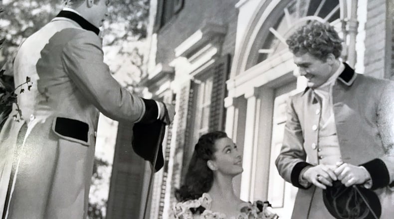Fred Crane, Vivien Leigh and George Reeves in the opening scene of "Gone With the Wind," which features the door that is being auctioned off next month.