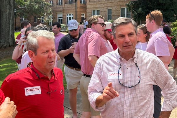Georgia Gov. Brian Kemp (left) showed his support for Republican U.S. Senate candidate Derek Dooley in Athens on Saturday.