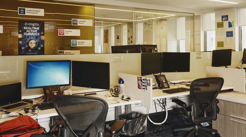 Desks at the MetLife call center in Warwick, R.I., in 2019. (Tony Luong/The New York Times)