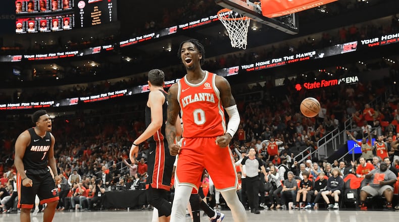 Hawks' guard Delon Wright (0) reacts after scoring during the first half in Game 3 of the first round of the NBA playoffs at State Farm Arena on Friday, April 22, 2022. (Hyosub Shin / Hyosub.Shin@ajc.com)
